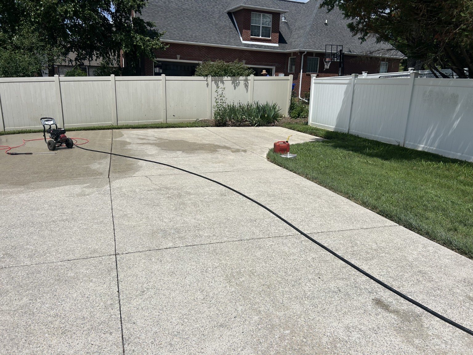 Dirty driveway before pressure washing in Cookeville